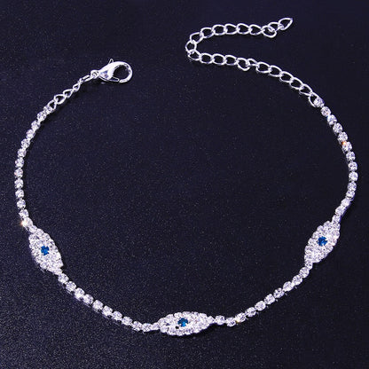 Vintage blue evil eye anklet bracelet by Red Iphigenia featuring crystals, perfect for beachwear and boho style.