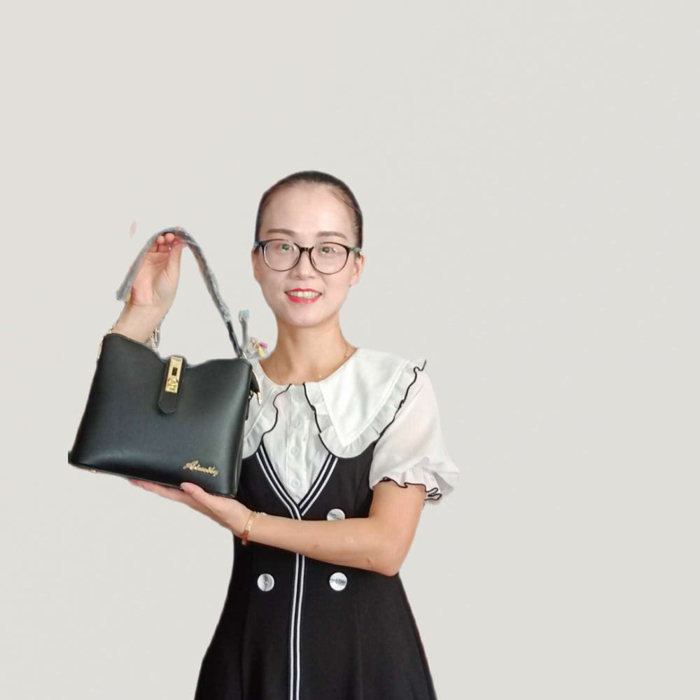 Jade Lemon student backpack with multiple compartments in black, featuring adjustable shoulder straps and a sleek schoolbag design.