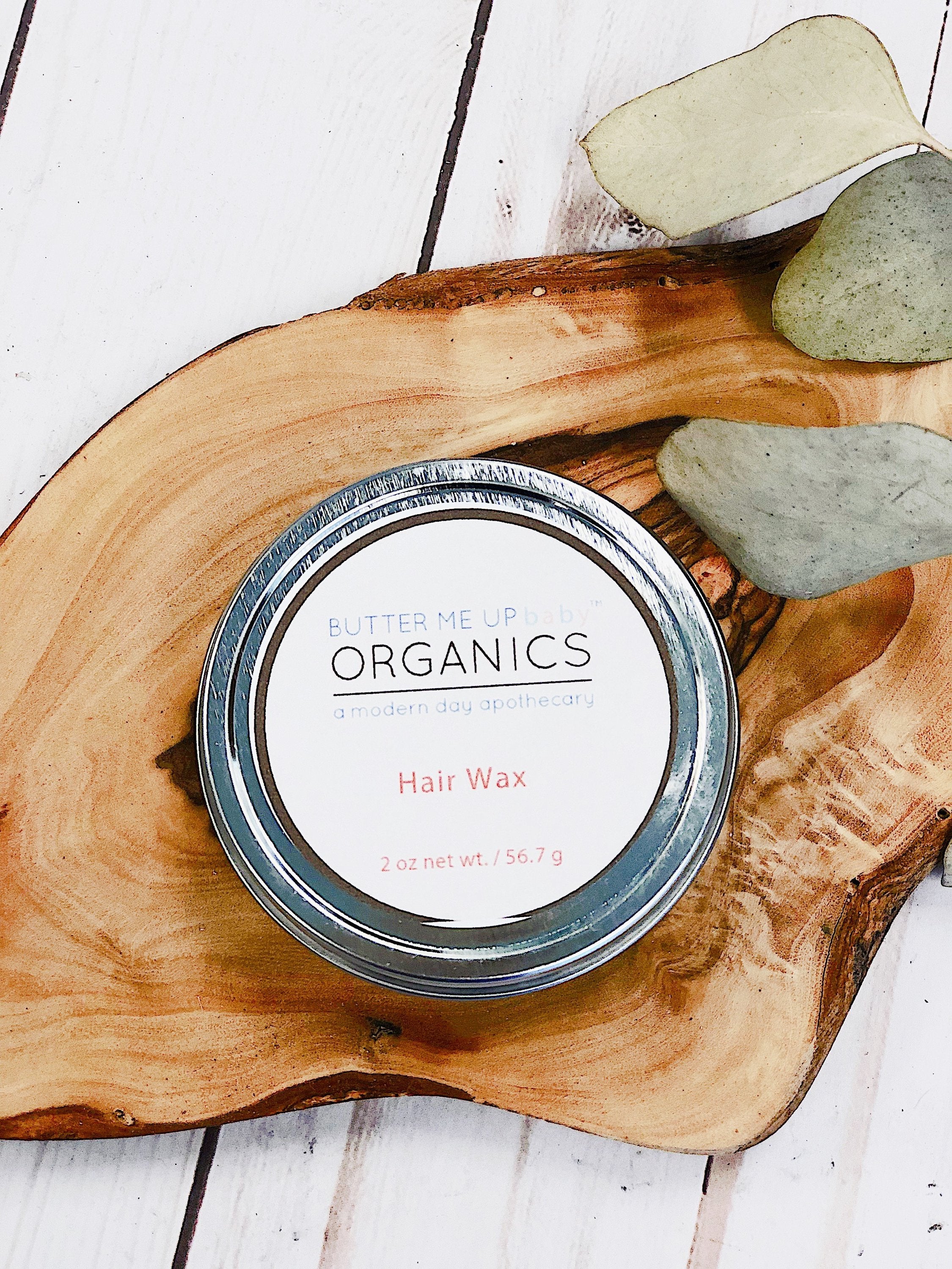 White Smokey organic hair wax for babies, children, and adults, showing the natural wax texture in a jar.