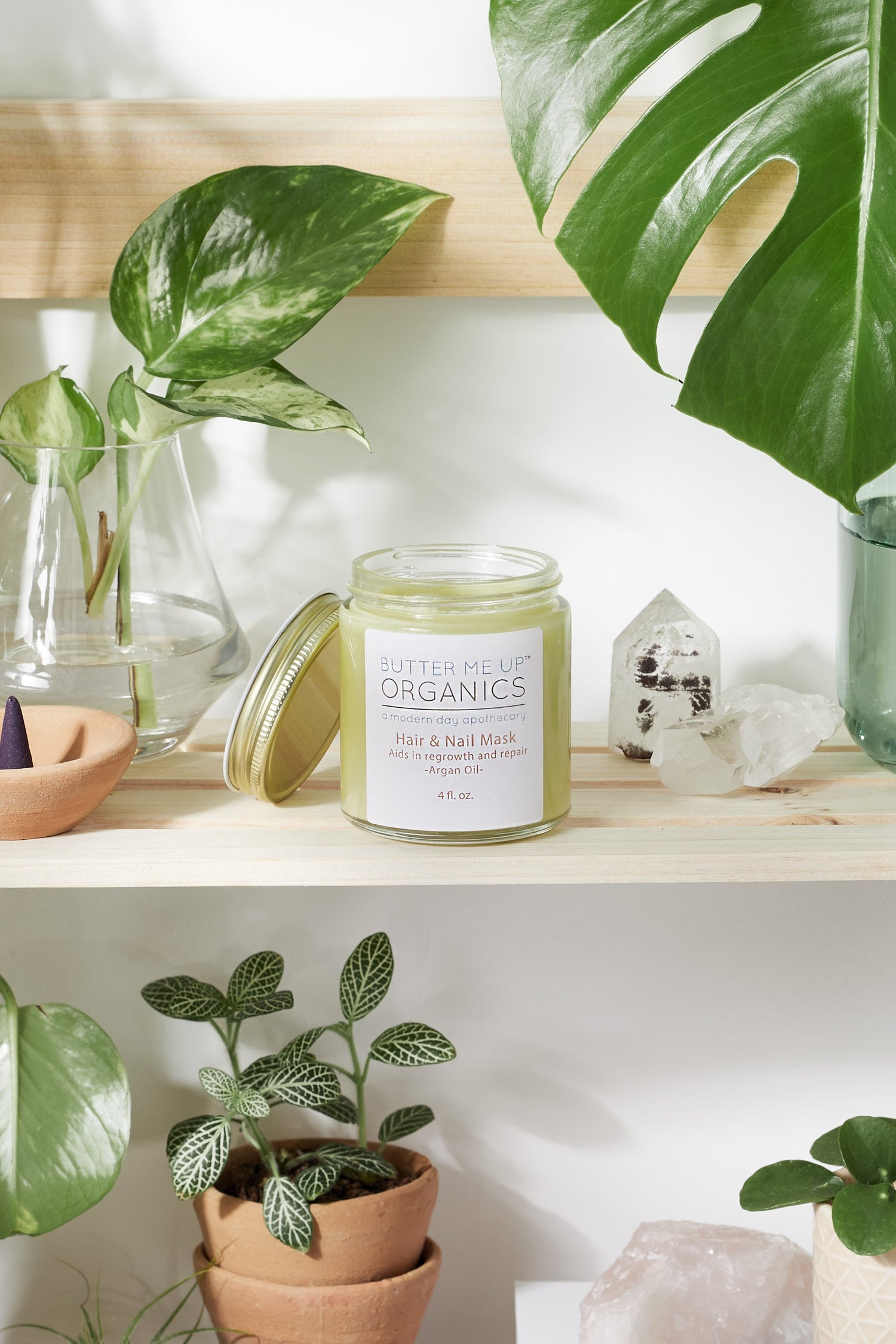 White Smokey Hair and Nail Mask for healthy nails and long hair growth, shown in a sleek jar with creamy texture.