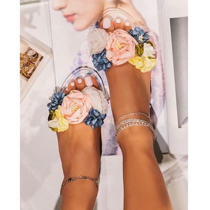 Transparent flower design summer beach slippers for women by Coffee Jasper, featuring lightweight, stylish slip-on footwear.