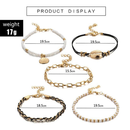 Multi-layered gold shell pendant chains ankle bracelet with delicate design, by Coffee Jasper, featuring layered gold and shell accents.
