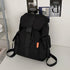 Jade Lemon student backpack with adjustable straps, multiple compartments, and durable fabric for school use.