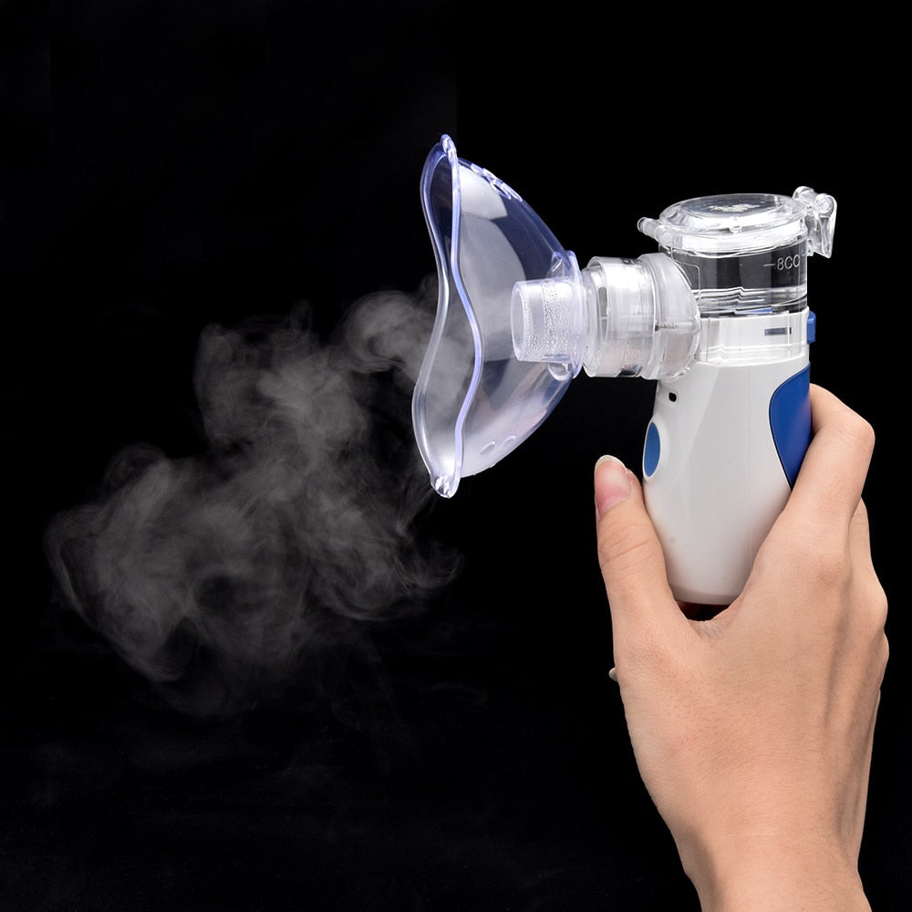 Maroon Asteria portable nebulizer inhaler for babies, compact skincare device with misting nozzle for inhalation therapy.
