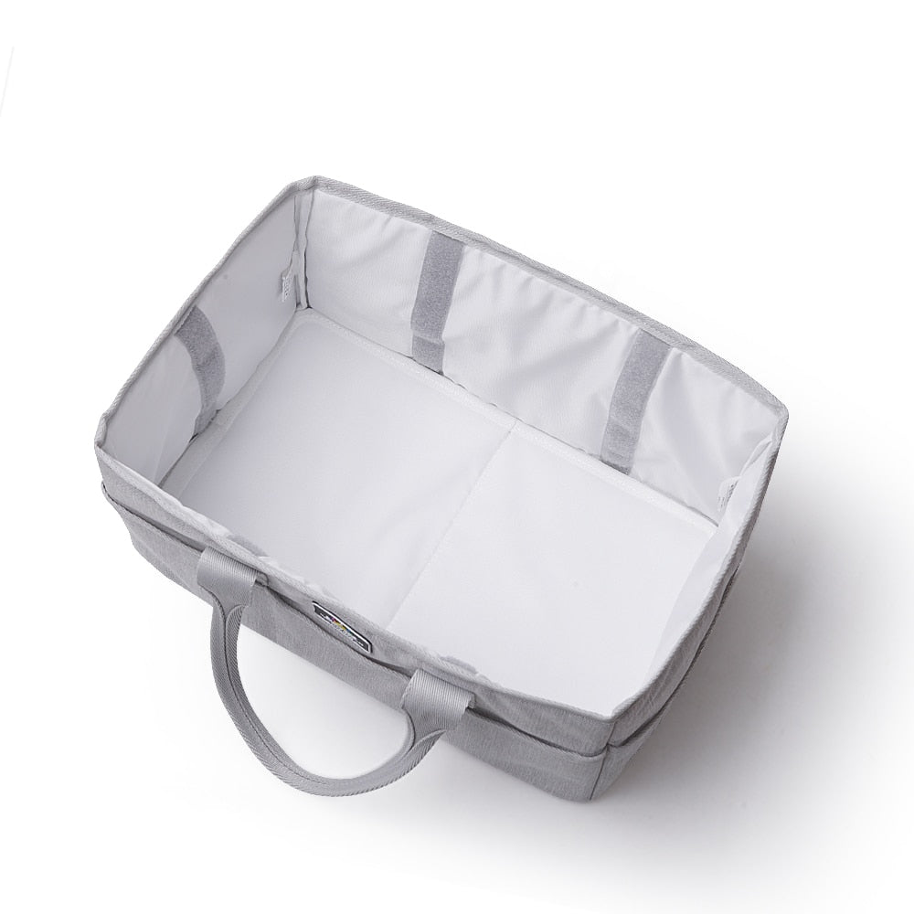 Maroon Chronos diaper caddy for kids and babies, featuring organized compartments for easy diaper and baby essentials storage.