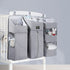 Maroon Chronos baby diaper caddy with dividers for organizing diaper supplies and essentials in a nursery or changing area.