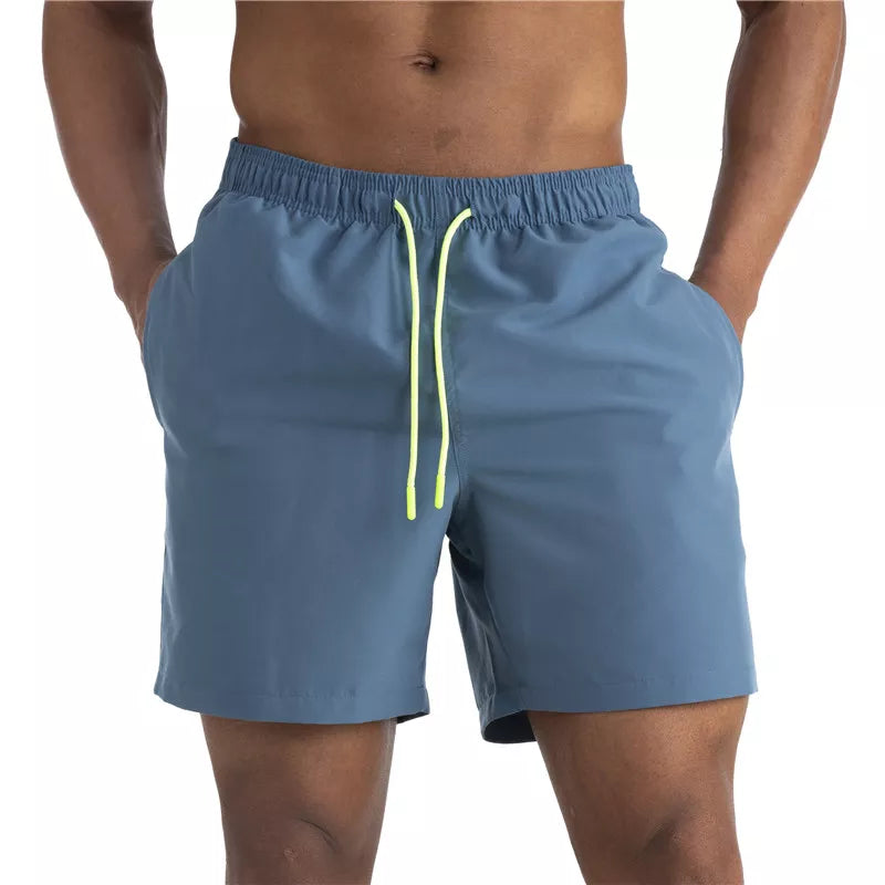 Raspberry Eurybia swimwear beach shorts, lightweight and quick-drying, featuring a vibrant pattern perfect for swimming and beach outings.