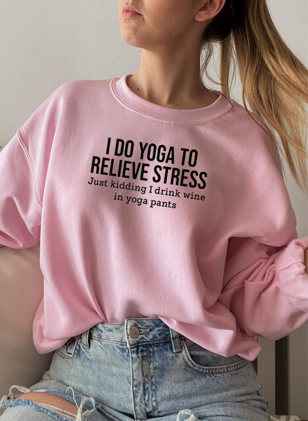 Black Jade Thalassa "I Do Yoga to Relieve Stress" T-shirt with yoga-inspired text design.