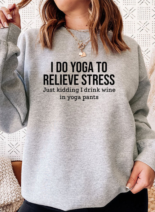 Black I Do Yoga to Relieve Stress T-shirt by Jade Thalassa featuring a relaxed fit and stress-relief yoga message.