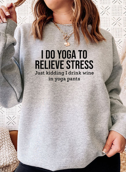 Black I Do Yoga to Relieve Stress T-shirt by Jade Thalassa featuring a relaxed fit and stress-relief yoga message.