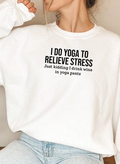 Black Jade Thalassa "I Do Yoga to Relieve Stress" T-shirt with yoga-themed text and comfortable fit, perfect for casual wear.