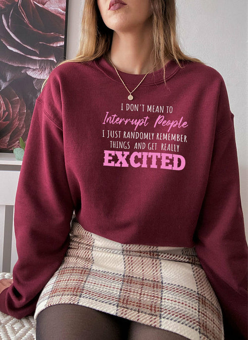 Jade Thalassa excited sweatshirt T-shirt with bold printed text, casual fit, and vibrant design on light fabric.