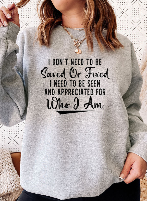 Black Jade Thalassa "I Don’t Need To Be Saved Or Fixed" T-shirt with bold print on the front.