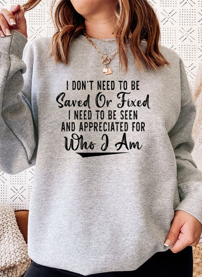 Black Jade Thalassa "I Don’t Need To Be Saved Or Fixed" T-shirt with bold print on the front.