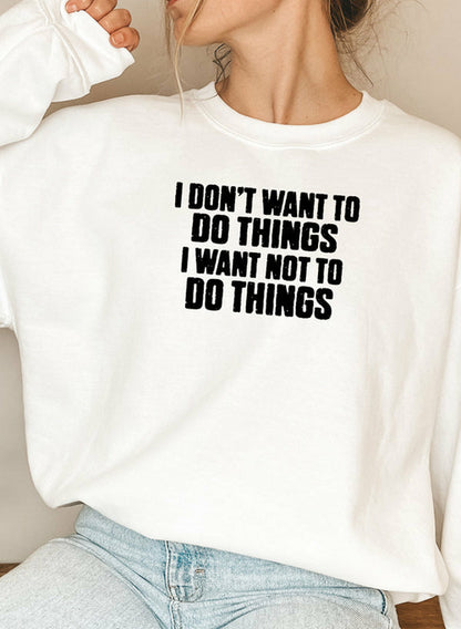 Black "I Don’t Want To Do Things" sweatshirt by Jade Thalassa featuring casual, comfortable T-shirt style with bold text design.