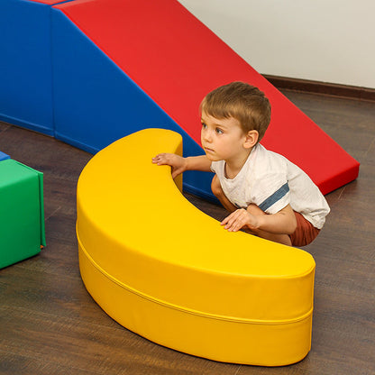 Blush Apricot Iglusoftplayr banana-shaped furniture piece for children, soft and colorful for playful indoor use.