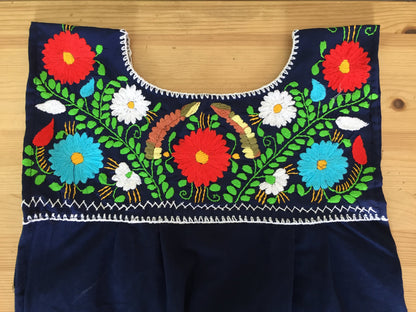 Violet Athena Maxi Isidra hand-embroidered Mexican loose dress for women, featuring colorful traditional embroidery and flowing fabric.