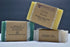 Organic coconut soap by Burgundy Crius, vegan healthcare soap with natural coconut ingredients, showing a bar of soap on a neutral background.