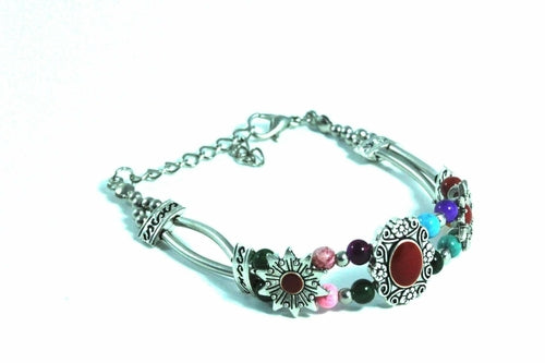 Sweet Sunflower Boho bracelet by Silver Hestia featuring sunflower charms and beaded design on a soft leather band.
