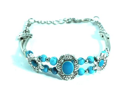 Silver Hestia Sweet Sunflower Boho bracelet featuring sunflower charms and bohemian style beads on a silver chain.
