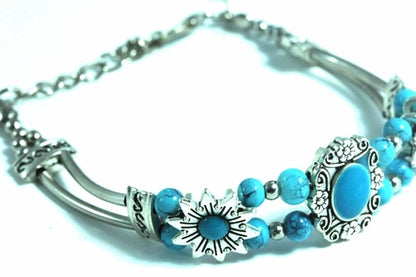 Silver Hestia Sweet Sunflower Boho bracelet with sunflower charms and beaded details, styled for a bohemian look.