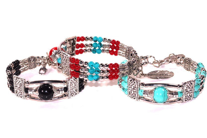 Silver Hestia feather charm and beads bracelet with delicate silver and colorful bead accents on a soft background.