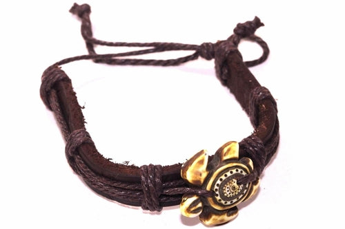 Silver Hestia tribal style bracelet with intricate silver detailing, featuring bold patterns and ethnic-inspired design.