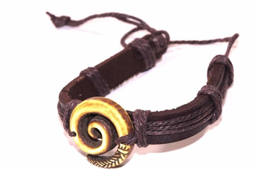 Silver Hestia tribal style bracelet with intricate bead and metal designs, showcasing bold jewelry craftsmanship.