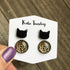 Glittery acrylic cheetah double cat earrings by Olive Felix, featuring bold feline designs and shimmering finish.