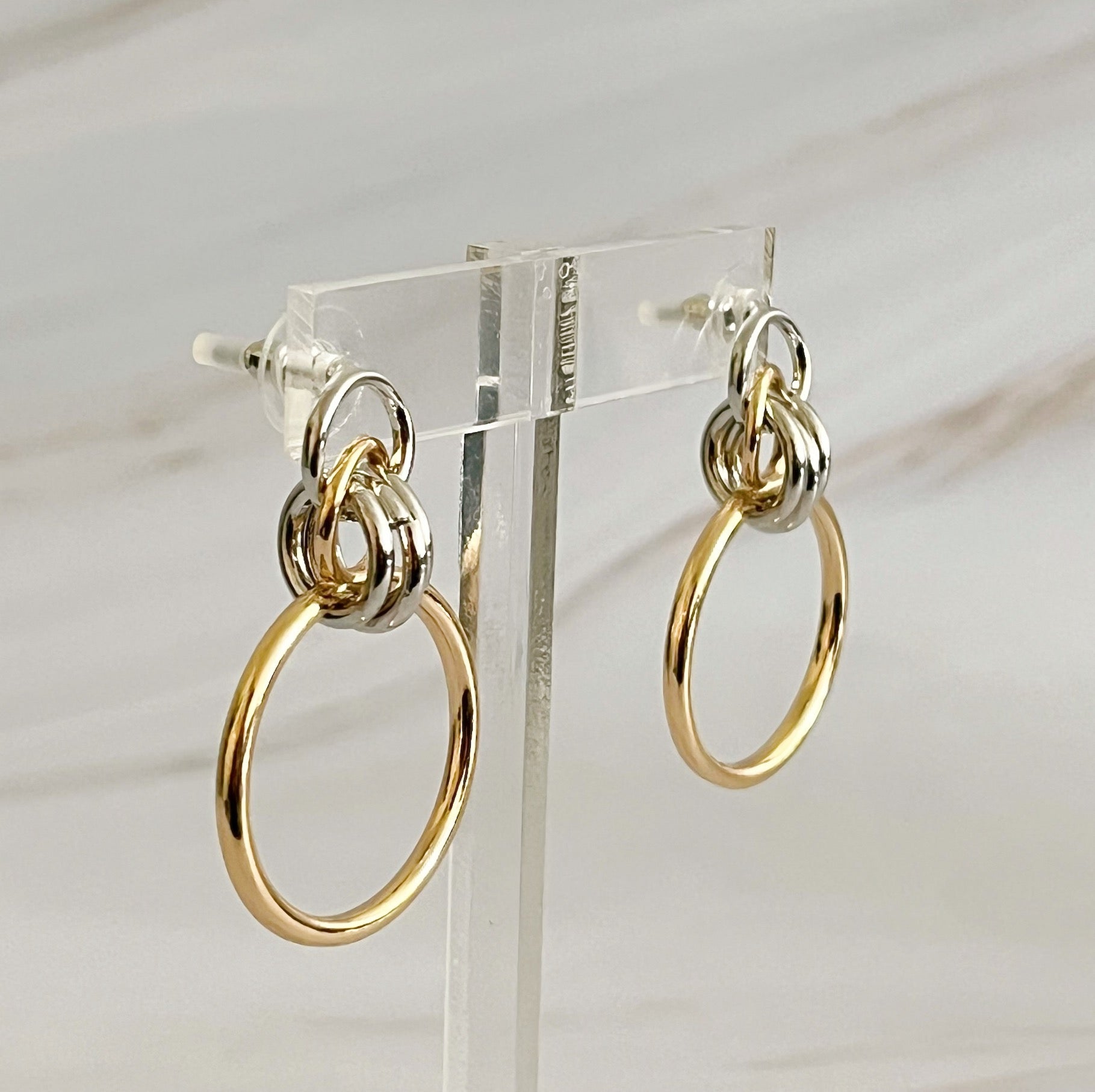 Fuchsia Hercules Knock On The Beauty hoop earrings, gold-tone jewelry with sleek hoop design, stylish accessory for women