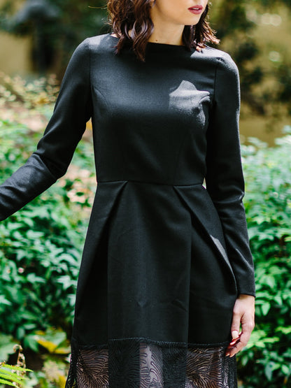 Salmon Bella First Lady Dress displayed on a mannequin, featuring elegant fabric and classic design for formal occasions.