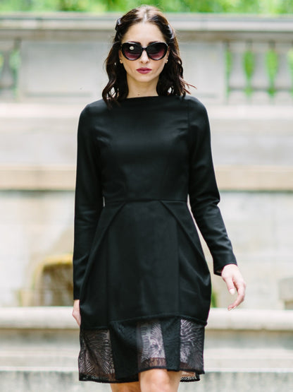 Salmon Bella First Lady Dress displayed on a hanger, featuring elegant fabric and classic design for formal occasions.
