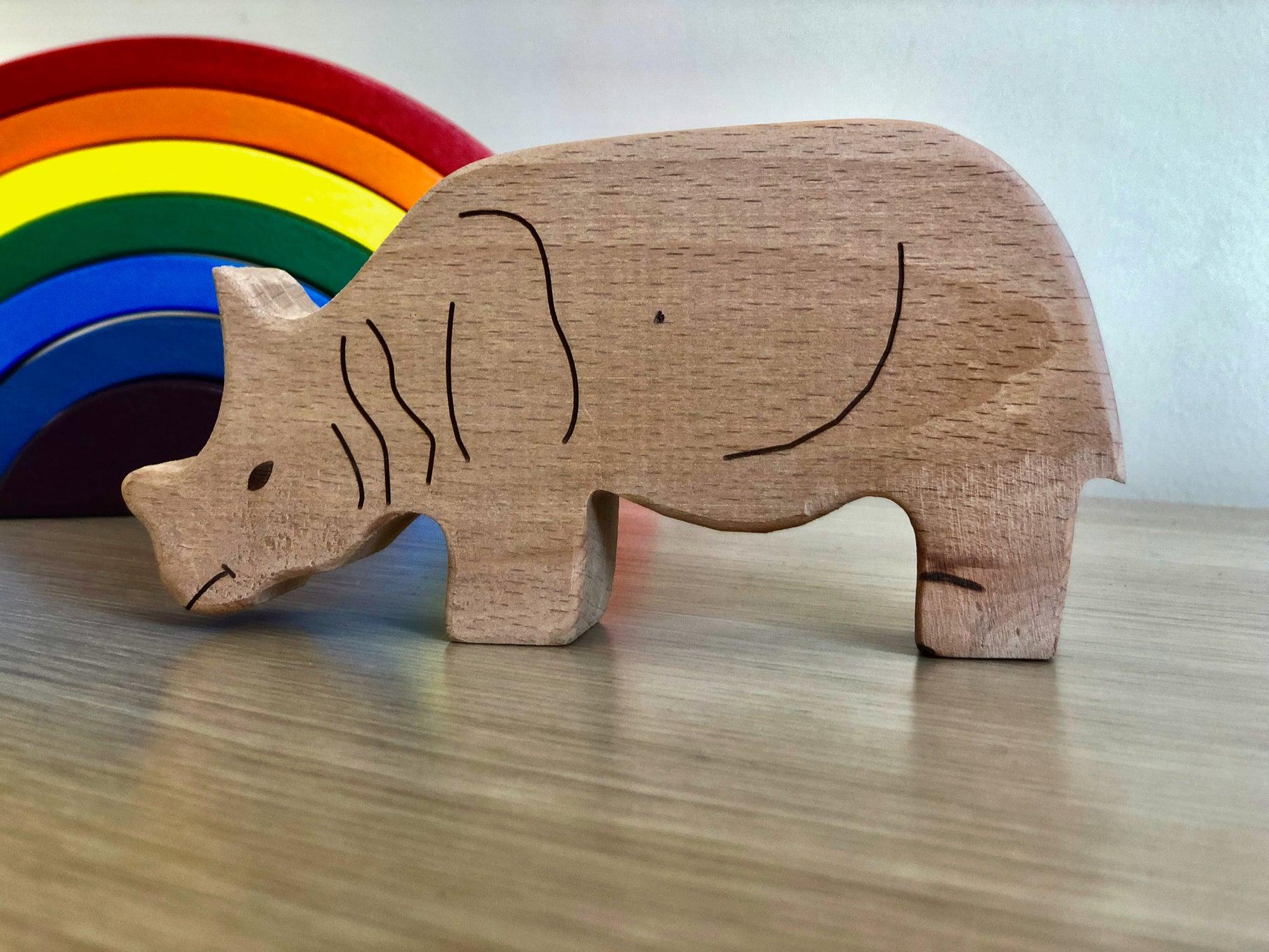 Wooden safari animal furniture set by Red Oceanus featuring handcrafted wooden animal figures for children&