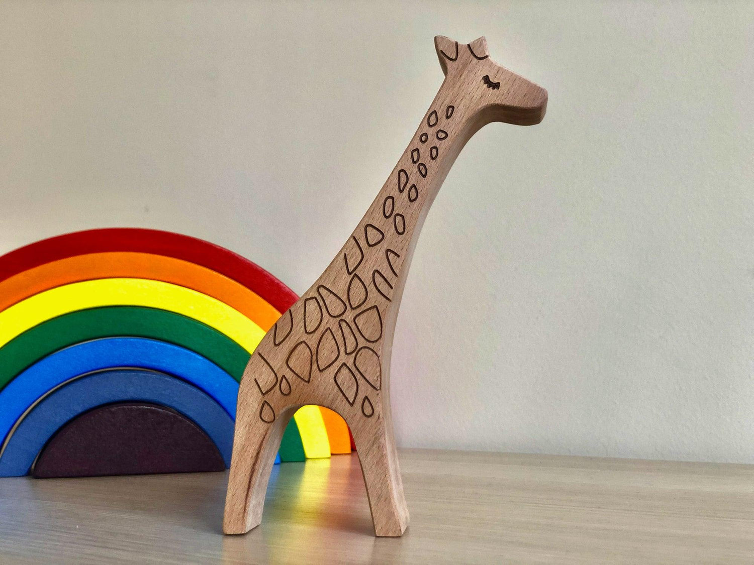 Wooden safari animals set by Red Oceanus, featuring handcrafted wooden animal figures for children&