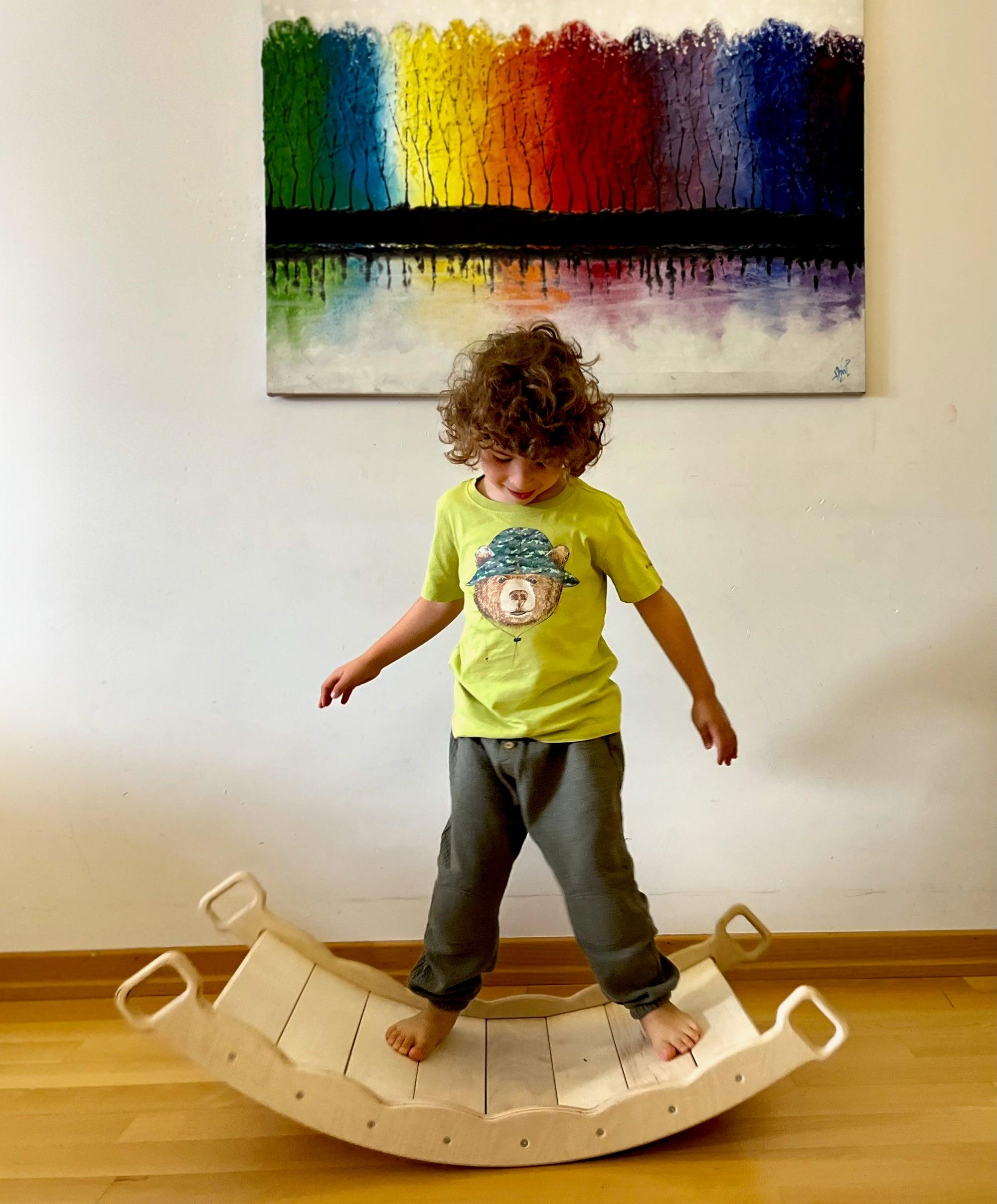 Red Oceanus XL wooden balance board with pillow for furniture use, featuring a natural wood finish and comfortable pillow support.
