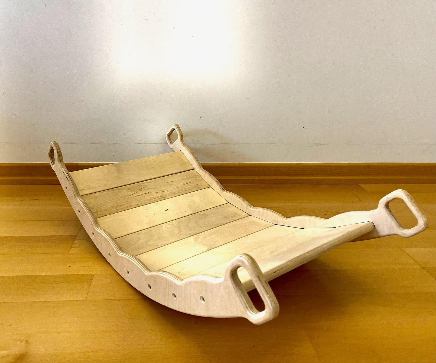 Red Oceanus XL Wooden Balance Board with Pillow for stability and comfort, featuring a natural wooden surface and soft pillow cushion.