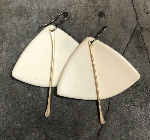 Handmade hypoallergenic lightweight ceramic statement earrings by Azure Nesoi, featuring elegant, modern jewelry design.