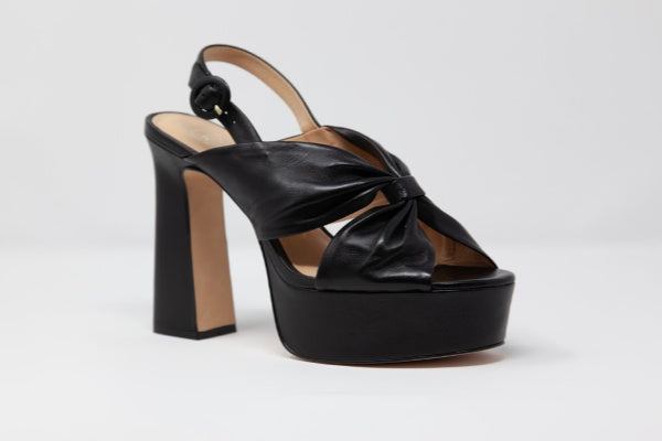 Apricot Hercules Stella Isidore heels featuring sleek design and pointed toes, shown on a neutral background.
