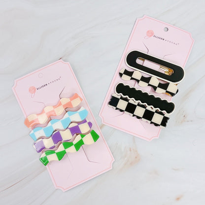 Set of four checkered wavy creaseless hair clips by Fuchsia Hercules, stylish jewelry accessories for hair styling.