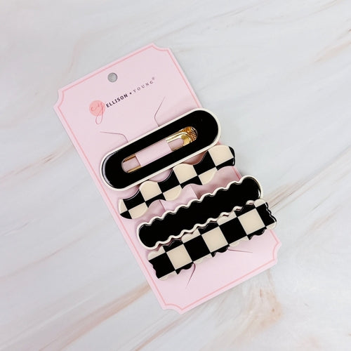 Set of four checkered wavy creaseless hair clips by Fuchsia Hercules, stylish jewelry accessories for hair styling.
