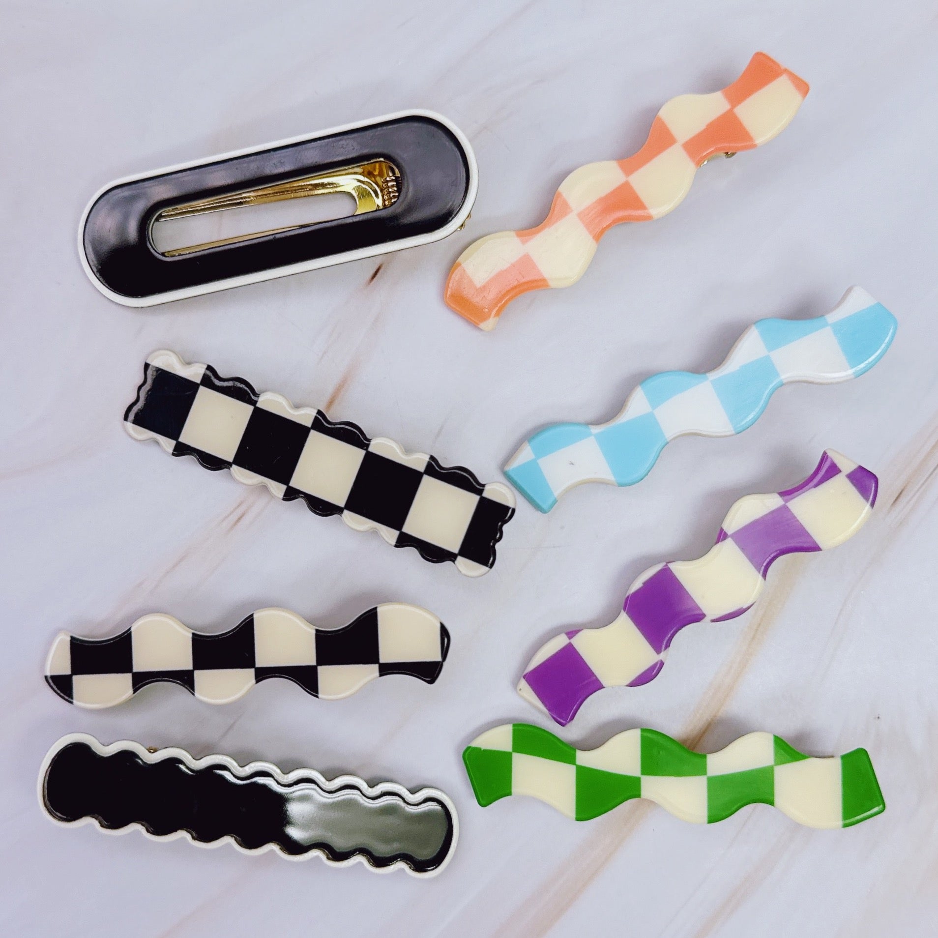 Set of four checkered wavy creaseless hair clips by Fuchsia Hercules, stylish jewelry accessories for hair styling.