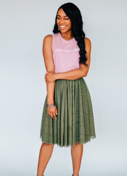 Salmon Bella Sweet Pea skirt featuring a flowy, floral design with a high waist and lightweight fabric for a feminine look.
