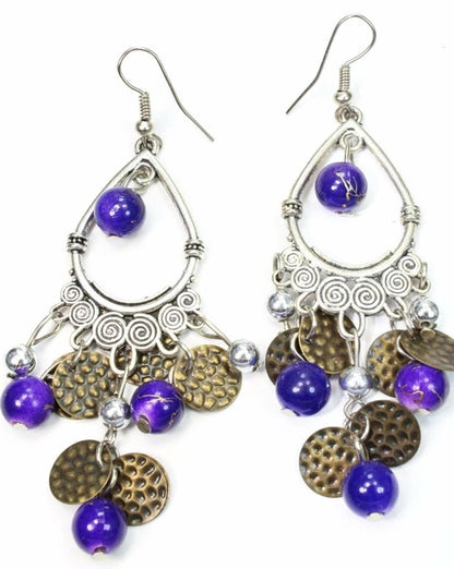 Silver Hestia Untamed chandelier earrings featuring intricate metalwork and dangling design, stylish statement jewelry for women.