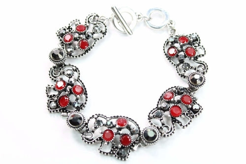 Silver Hestia Circle of Elephants bracelet featuring a circular design with detailed elephant charms on a silver chain.