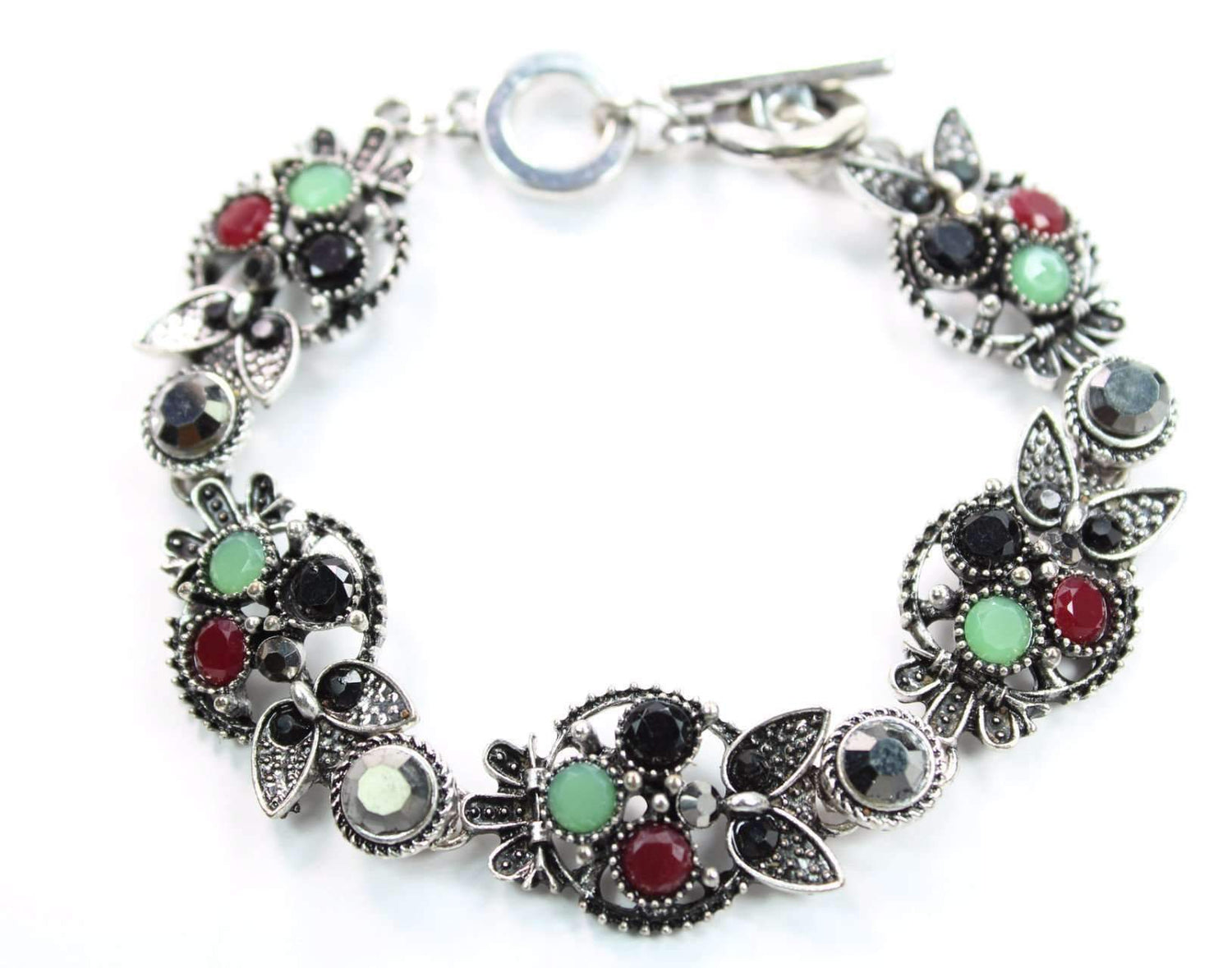 Silver Hestia Brilliant Multi Crystal Owl Bracelet featuring sparkling crystal owl charms on a silver chain.