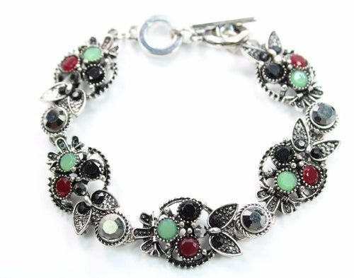 Silver Hestia Brilliant Multi Crystal Owl Bracelet featuring sparkling crystal owl charms on a silver chain.