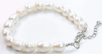 Silver Hestia lustrous oblong Baroque pearls bracelet featuring unique irregular-shaped pearls on a delicate silver chain.