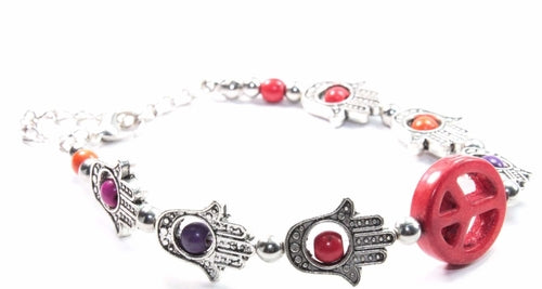 Silver Hestia Hamsa Hands and Peace Bracelet featuring intricate charm designs, perfect for stylish jewelry accessories.