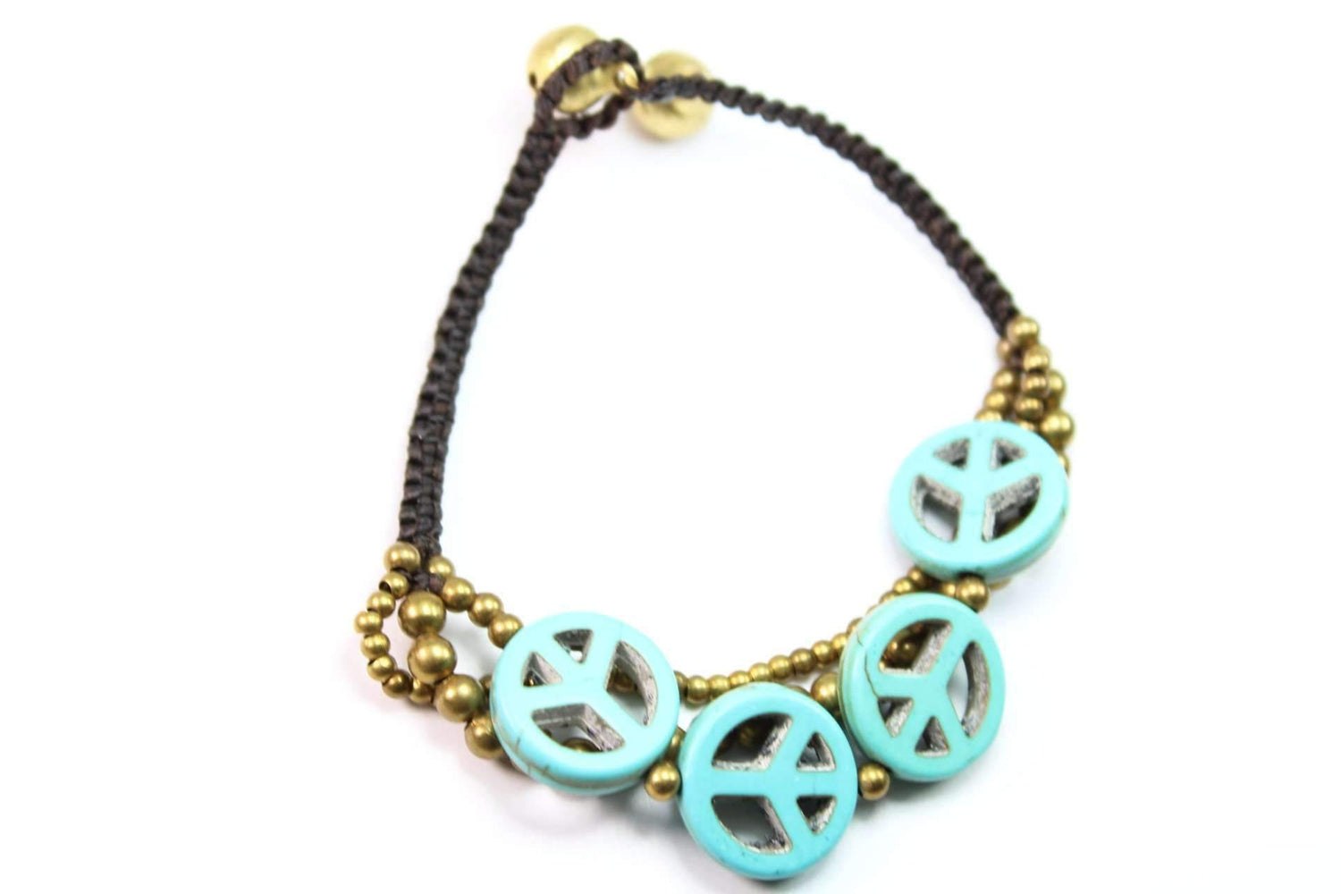 Silver Hestia boho peace symbol bracelet with adjustable cord and engraved peace design, stylish accessory for everyday wear.