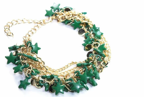 Silver Hestia three-tier star charm bracelet with layered silver chains and star pendants.